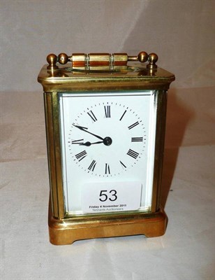 Lot 53 - A brass carriage timepiece and key
