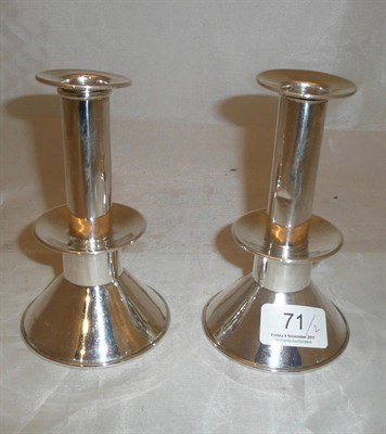 Lot 71 - A pair of 17th century-style silver candlesticks