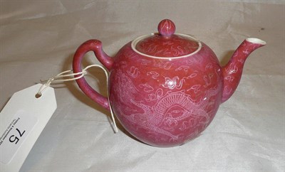 Lot 75 - A 20th century Chinese incised red ground teapot