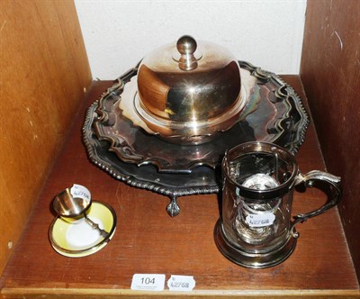 Lot 104 - Two plated salvers, a muffin dish and cover, glass mug with plated mounts, plated napkin rings etc