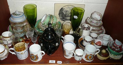 Lot 105 - A shelf of decorative ceramics including tea wares, commemorative mugs and large green glass...