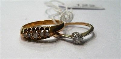 Lot 122 - An 18ct gold diamond five stone ring and a diamond solitaire ring