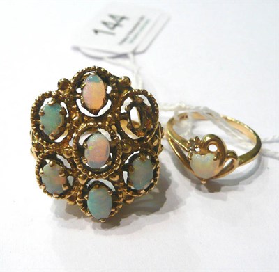Lot 144 - An opal ring stamped '14k' and an opal ring stamped '10k'