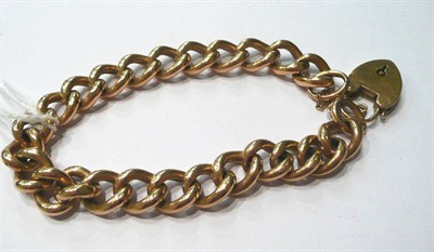 Lot 148 - A 9ct gold curb and lock bracelet, 18.8g