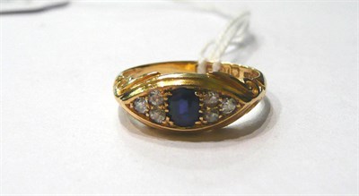 Lot 153 - An 18ct gold sapphire and diamond ring