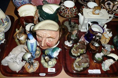 Lot 169 - Three Royal Doulton character jugs, Royal Crown Derby birds etc on two trays and a box