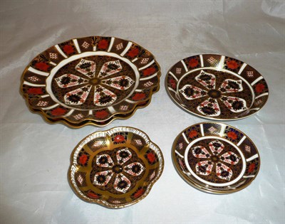 Lot 176 - A pair of Royal Crown Derby Imari pattern dishes with wavy rims, two pin dishes and two others