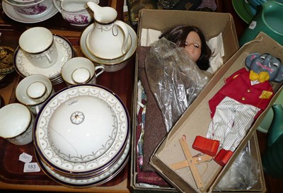 Lot 183 - A Cauldon part breakfast service, two wooden puppets and a doll with clothes