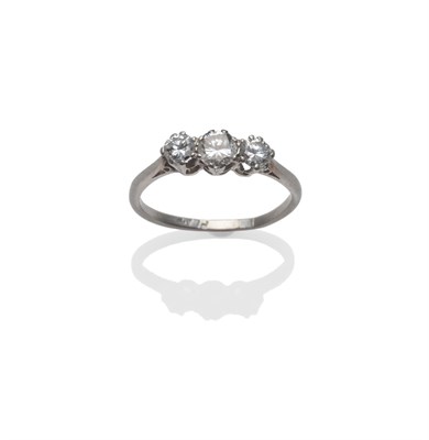 Lot 217 - A Diamond Three Stone Ring, the graduated round brilliant cut diamonds in a white claw setting,...