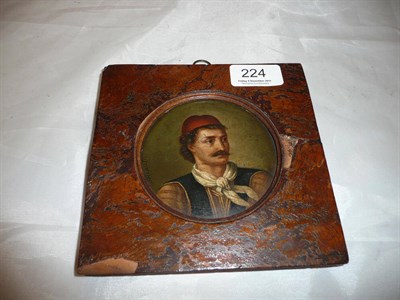 Lot 224 - A 19th century portrait of Miaoulis, mounted in a burr frame