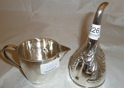 Lot 226 - A George IV silver wine funnel, London 1823 and a silver George III cream jug, London 1800 6.64oz