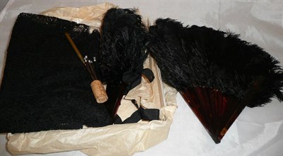 Lot 232 - Two black ostrich feather fans, a small quantity of hat pins, a black lace mantilla, a pair of...