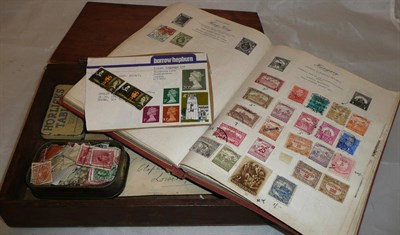 Lot 235 - A Collection of stamps in an album and loose