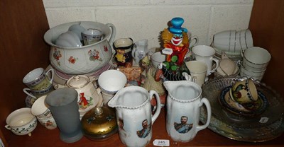 Lot 245 - Shelf of decorative ceramics and glass including a Murano clown, commemorative ware etc