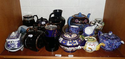 Lot 249 - A shelf of china including two studio bowls, Jackfield-type teapots etc
