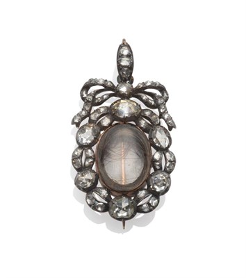 Lot 221 - A Mourning Brooch/Pendant, circa 1800, an oval locket containing a lock of hair, within a border of