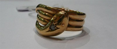 Lot 267 - An 18ct gold diamond set snake ring