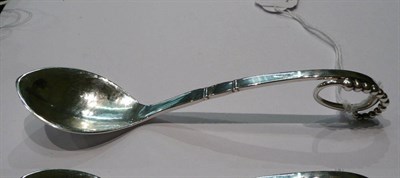 Lot 286 - A George Jensen spoon 88/500 stamped '925'