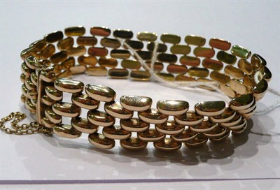 Lot 288 - A 9ct gold brick link bracelet, 37g