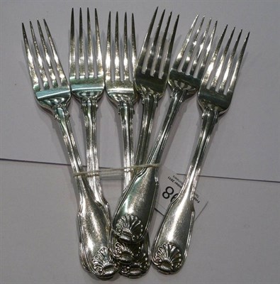 Lot 298 - A set of four George III silver fiddle thread and shell pattern dessert forks, London 1817 and...