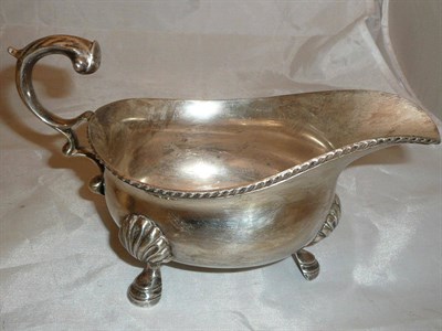 Lot 319 - A silver sauce boat