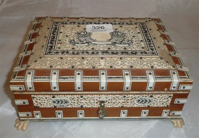 Lot 326 - An Indian carved ivory and sandalwood jewellery casket on claw feet, with letter of provenance