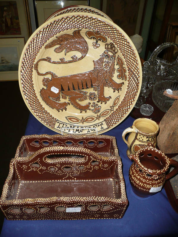 Lot 334 - John Hudson;Two large modern slipware "Thomas Toft" chargers, a cutlery tray, a mug and a...