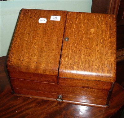 Lot 335 - An Edwardian large oak stationery casket