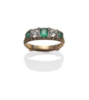 Lot 231 - An Emerald and Diamond Five Stone Ring, the step cut emeralds alternate with old cut diamonds, with