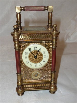 Lot 354 - A brass alarm carriage clock