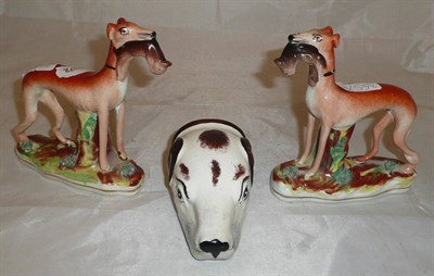 Lot 355 - Pair of Staffordshire greyhounds and a Staffordshire stirrup cup