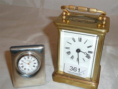 Lot 361 - A brass carriage timepiece and a small silver cased bedroom timepiece