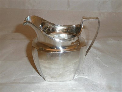 Lot 363 - A George III silver cream jug with canted corners, London 1801, 4.7oz