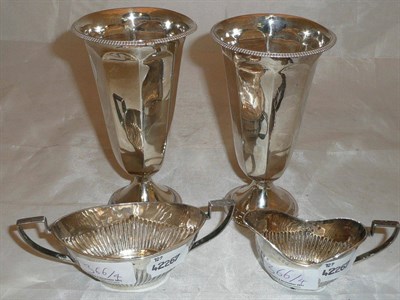 Lot 366 - Pair of silver trumpet vases (filled), and small sugar and cream jug (4), 22oz gross weight