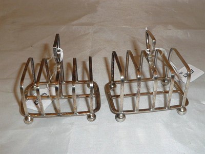 Lot 371 - A matched pair of silver five bar toast racks, 4oz