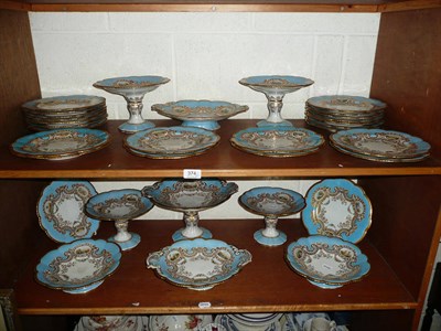 Lot 374 - A 19th Century extensive porcelain dessert service, the bleu de ciel border painted with...