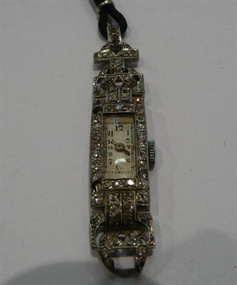 Lot 387 - A lady's diamond set wristwatch, case inscribed platinum