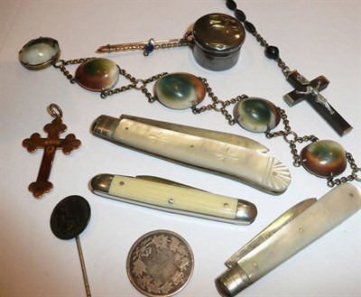 Lot 403 - A 9ct gold crucifix pendant, a sapphire set bar brooch, three silver and mother of pearl fruit...