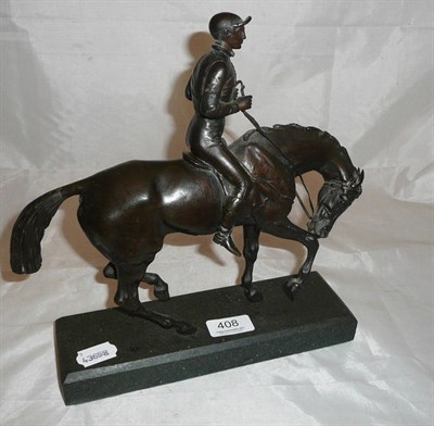 Lot 408 - A 19th century French bronze figure of a racehorse with jockey up, on a later granite plinth (a.f.)