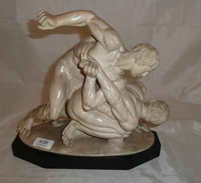 Lot 409 - Composition group - classical naked wrestlers