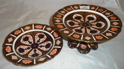 Lot 420 - A Royal Crown Derby Imari patter tall comport and matching low comport