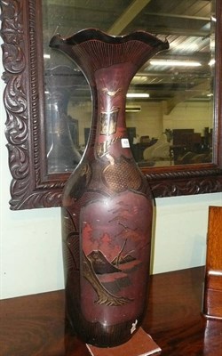 Lot 424 - A large Japanese vase with lacquered decoration