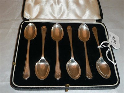 Lot 429 - A set of six silver golfing teaspoons, Sheffield 1933, 2.64oz, cased