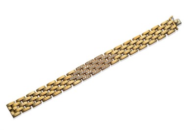 Lot 241 - An 18 Carat Gold Panthère Diamond Bracelet, by Cartier, of yellow brick links, the central section