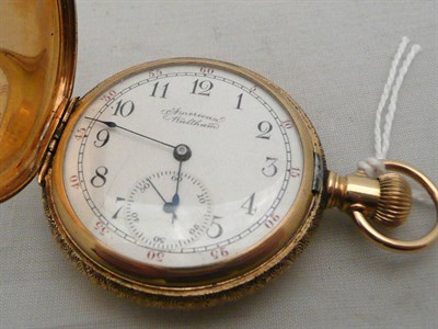 Lot 456 - A full hunter pocket watch, case stamped 14k, by Waltham