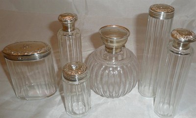 Lot 475 - Six silver topped bottles