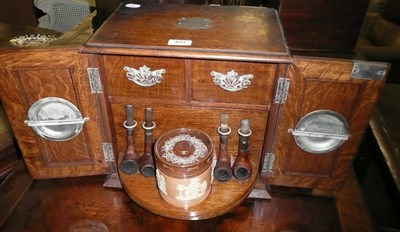 Lot 489 - Presentation smokers cabinet with Doulton stoneware jar