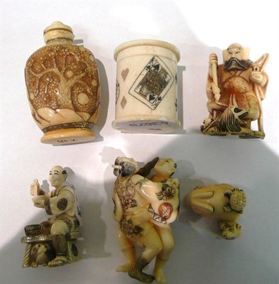 Lot 521 - Four Netsukes, snuff bottle and a dice set in box