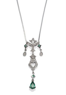 Lot 249 - An Emerald and Diamond Pendant on Chain, the drop pendant set with diamonds, and a pear cut and...
