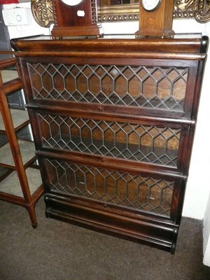 Lot 599 - A stacking bookcase